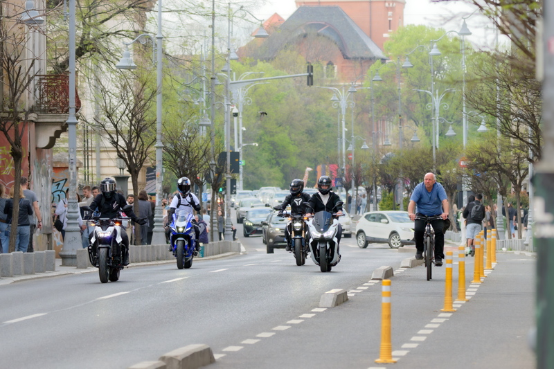 Motorcyclists in traffic 2